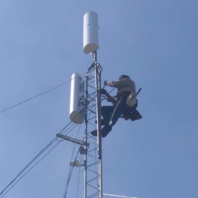 Tower climber Leonard Smith installs some cabling to the radios on top of our new tower south of Fort Cobb Lake